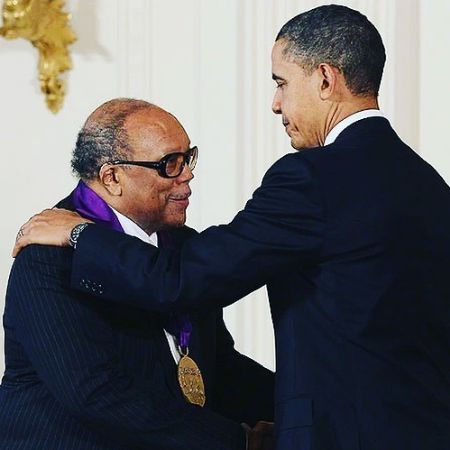 Kenya Kinski-Jones' father, Quincy Jones getting awarded by the 44th U.S president, Barack Obama.